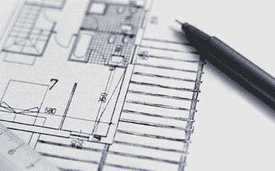 pen resting on architectural drawing