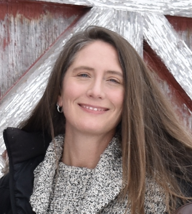 Jill Giacomini outside, smiling for the camera