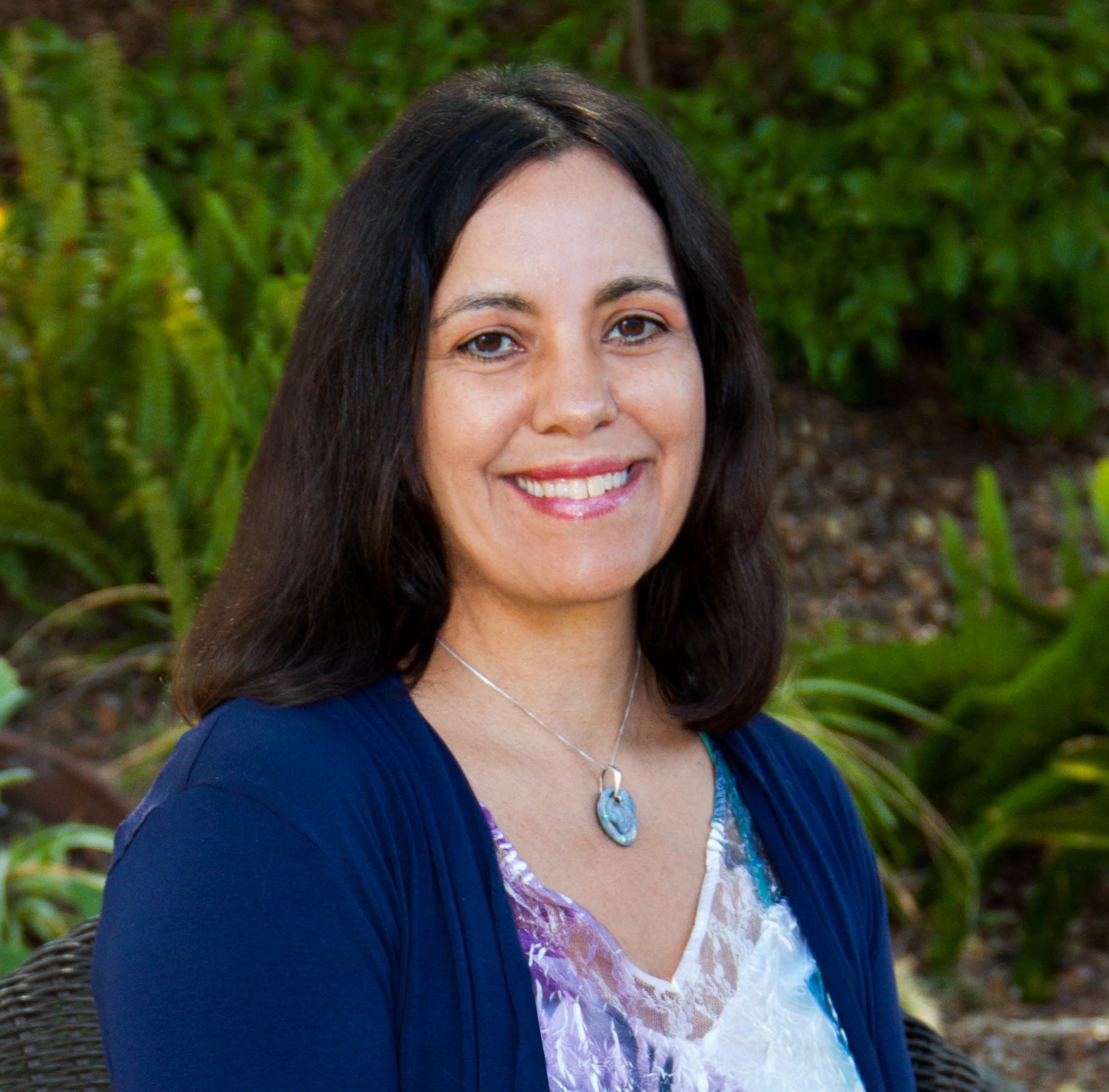 Dr. Lia Schraeder smiling outside