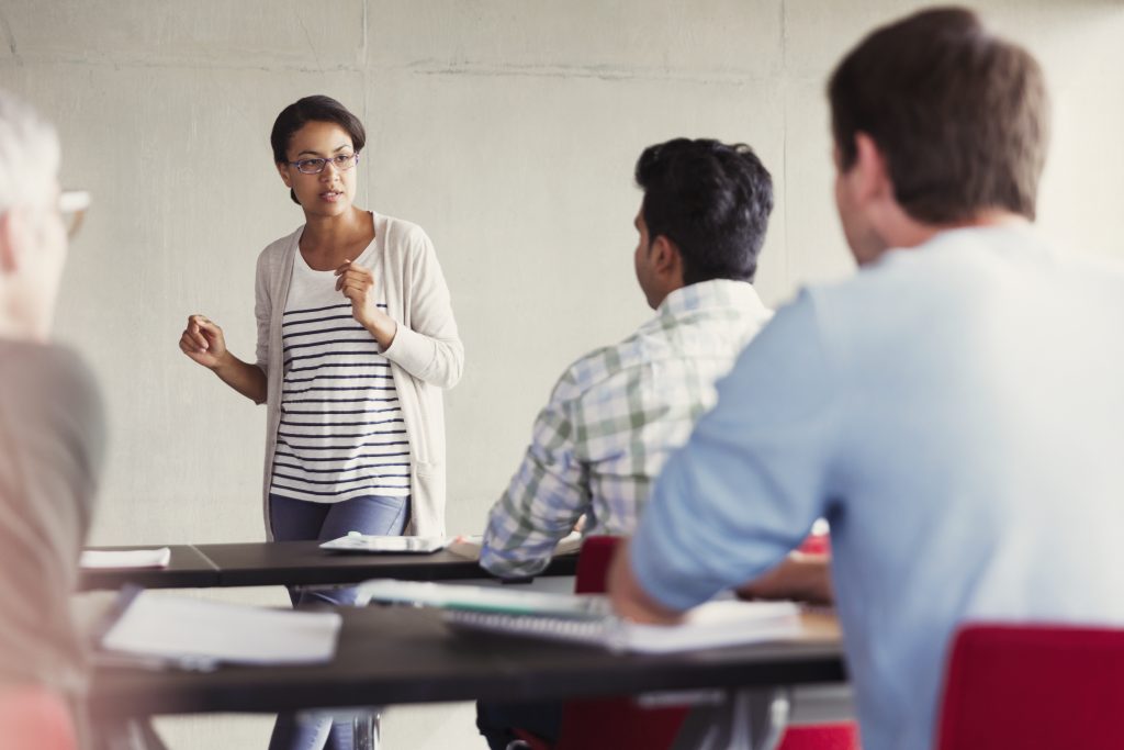 Teacher talking to classroom of students