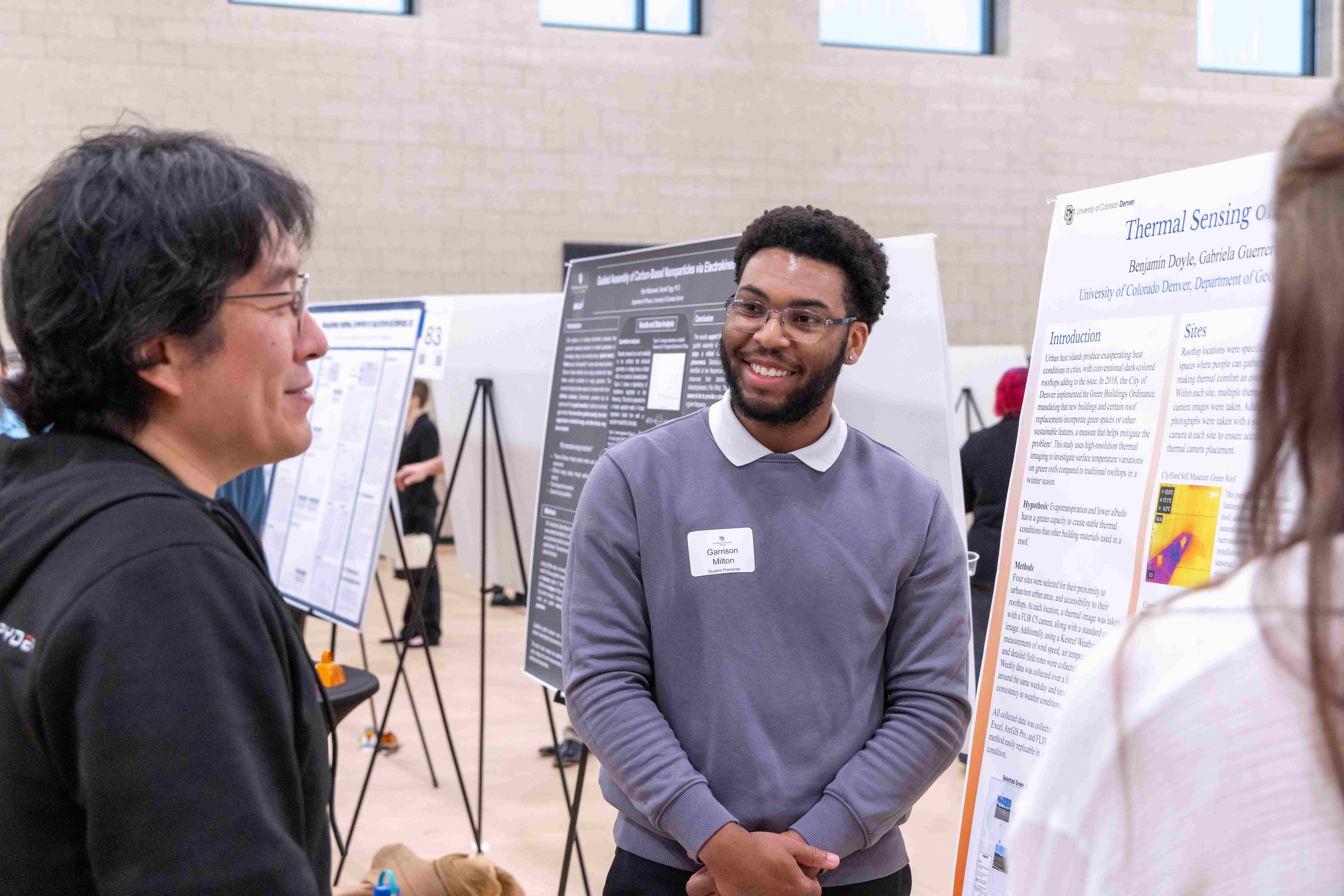 Student talking to Faculty