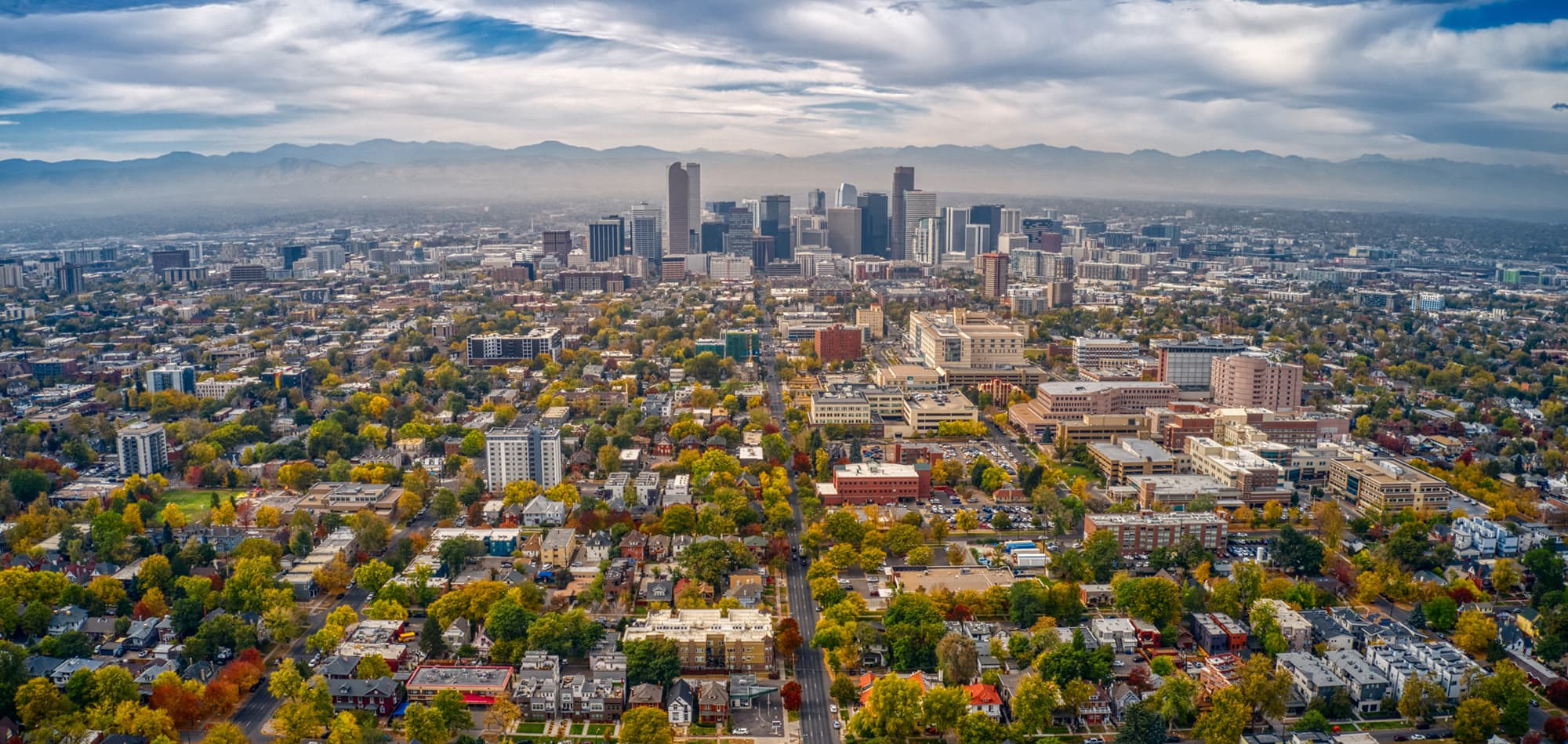 Aerial view of Denver and housing surrounding the city.