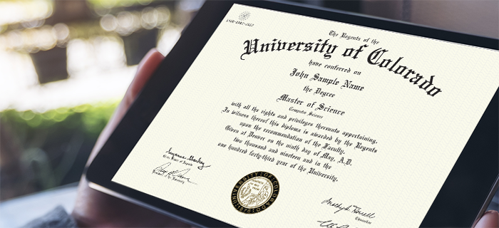 Register-ucdenveredu_700x320 Image of a CU Denver student holding a University of Colorado degree
