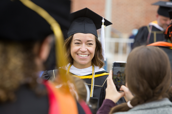 A woman graduates from college