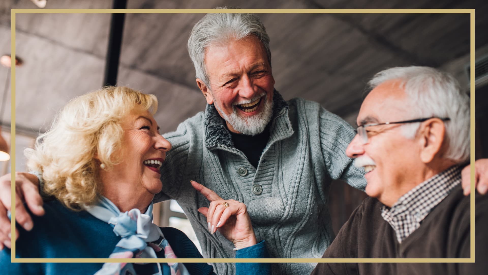 A group of older adults chatting and laughing