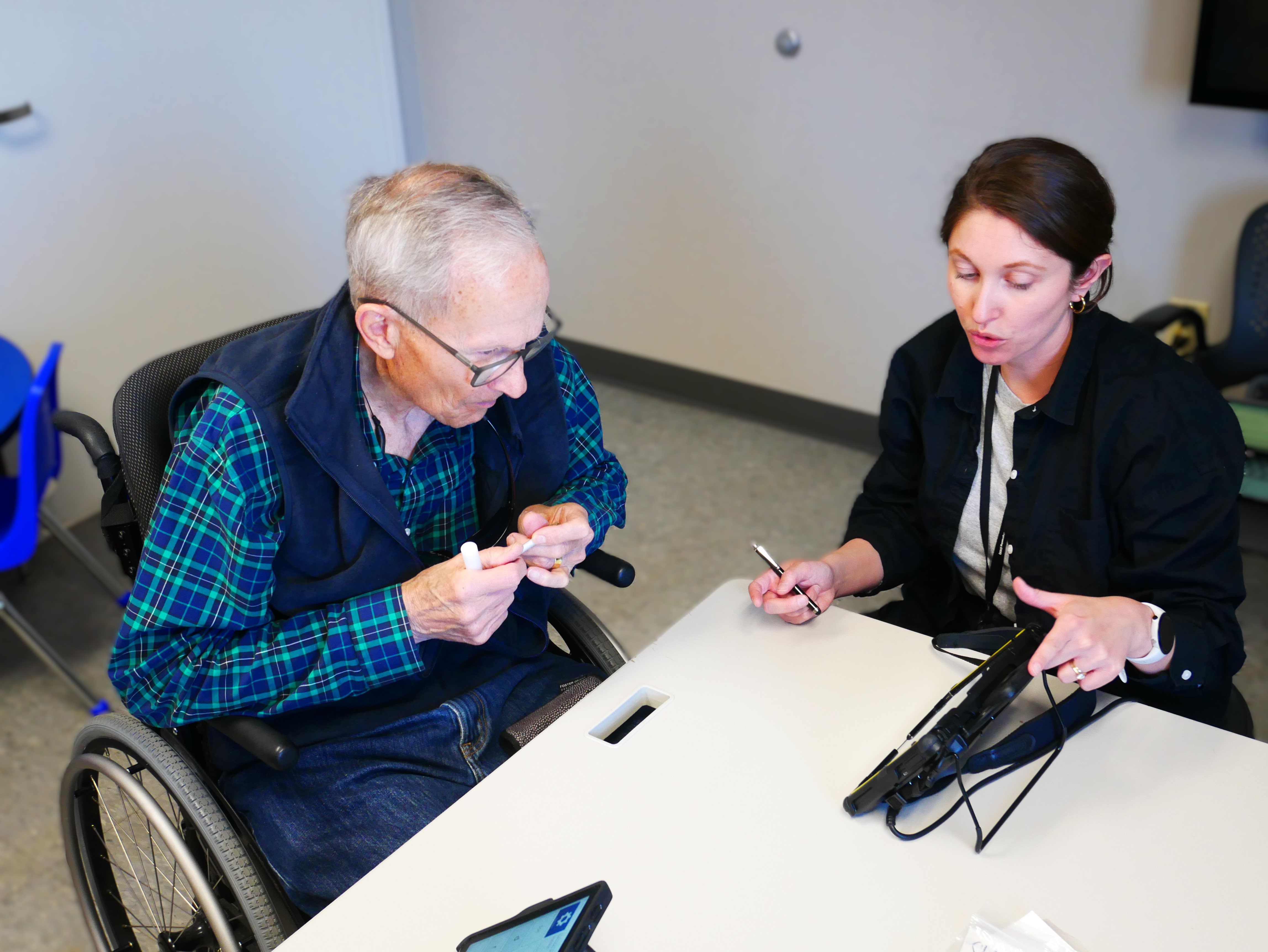 researcher with older adult